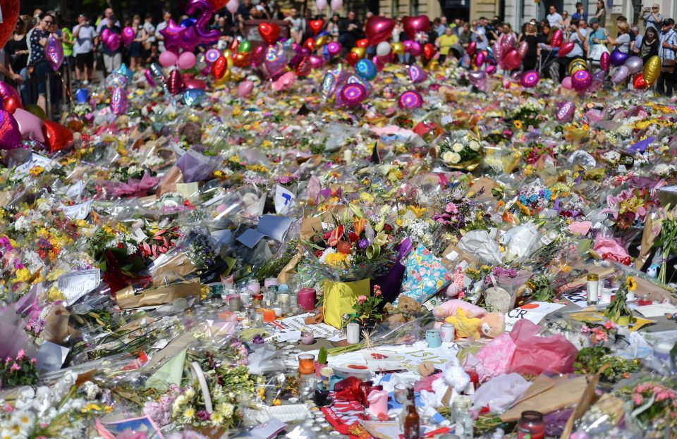  Tributes have poured in the centre of Manchester following the attack on Monday