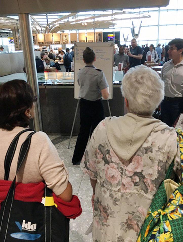  British Airways staff had to use white boards to deliver notices to passengers