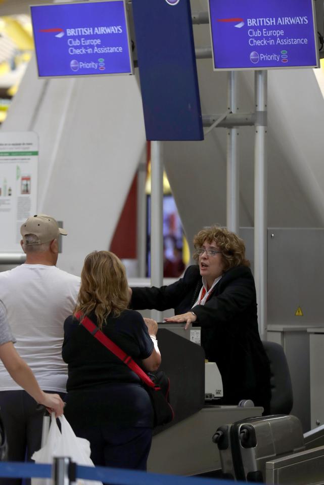  Holiday-makers were told they could not fly, with these travellers pictured at British Airways' Check-in at terminal 4 of Adolfo Suarez Madrid-Barajas airport in Madrid