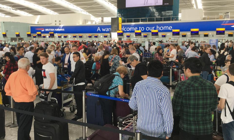  Crowds of holiday-makers wait at Heathrow Airport after British Airways flights were cancelled