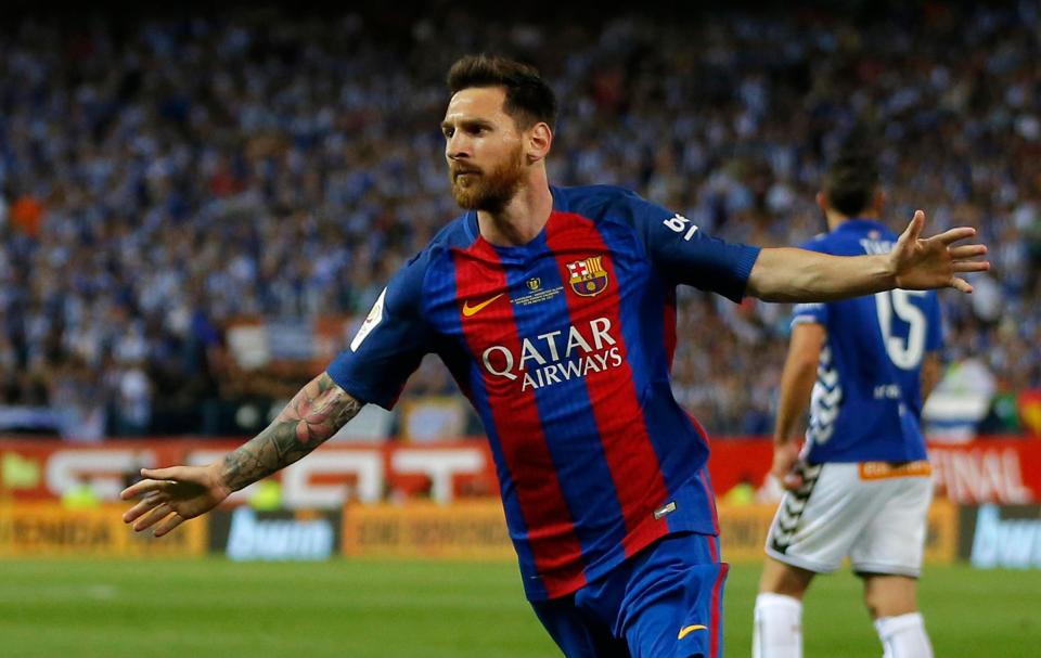  Lionel Messi celebrates after curling opener into back of Alaves' net