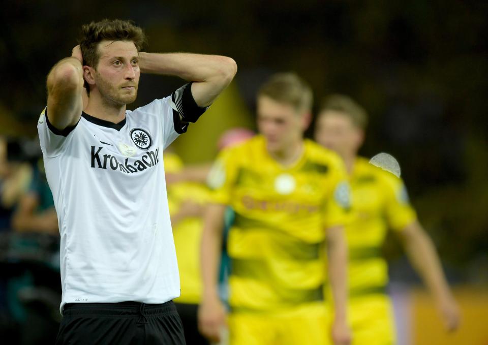  Frankfurt's David Abraham looks dejected after the German DFB Cup final loss