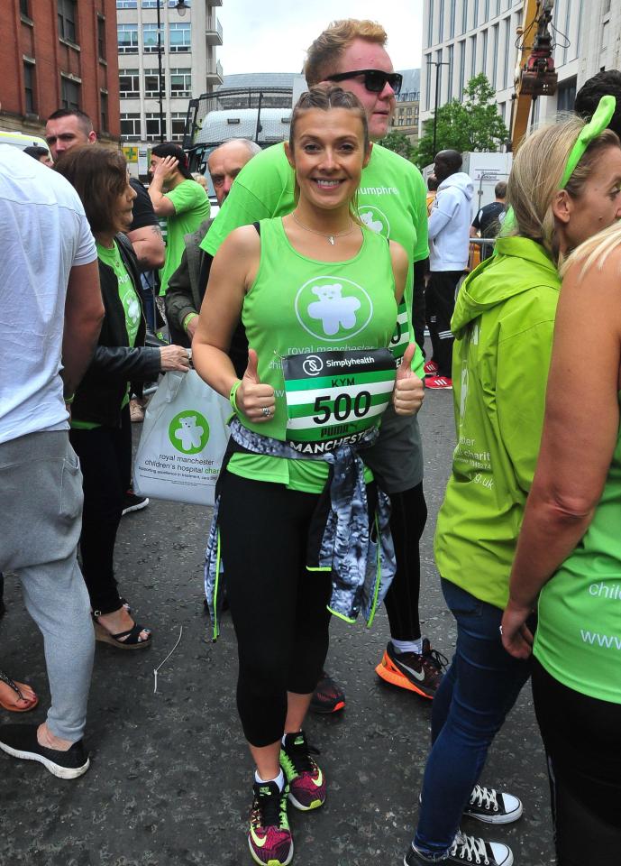  Kym beamed as she took part in the charity run