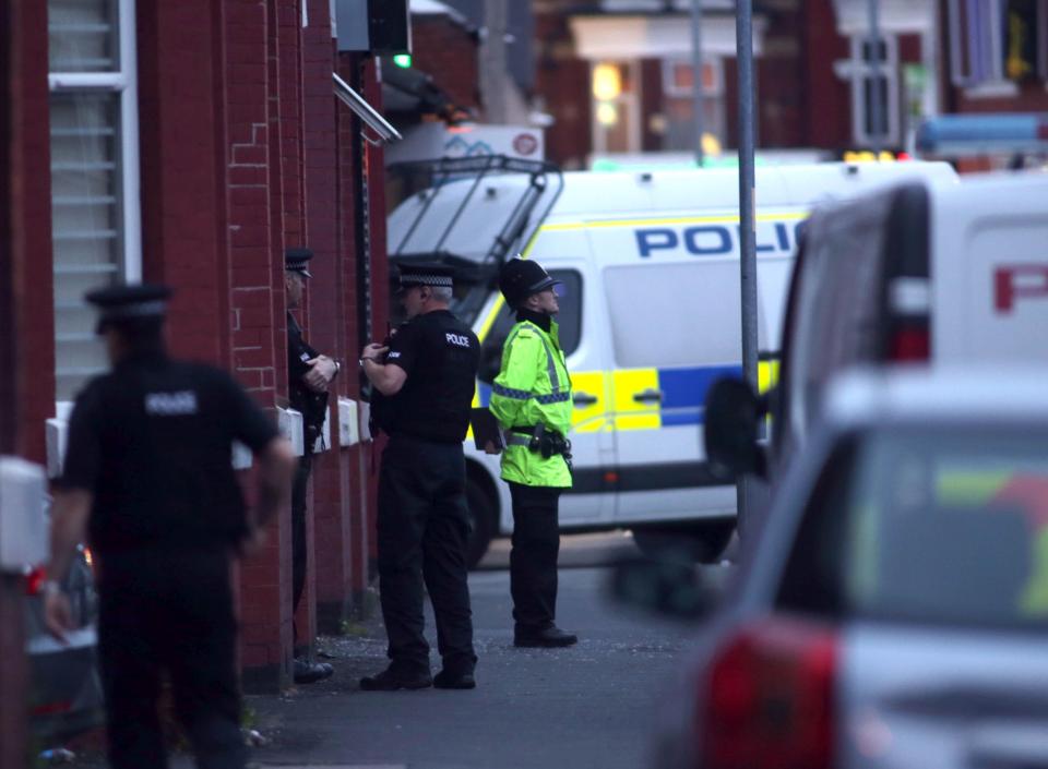  Police raid a property in Rusholme, Manchester, yesterday