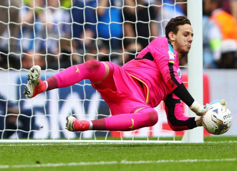  Danny Ward makes a crucial penalty shootout save from Jordan Obita