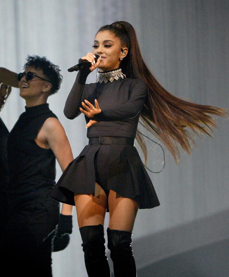  Ariana Grande performs on stage during the "Dangerous Woman" Tour Opener at Talking Stick Resort Arena on February 3, 2017 in Phoenix, Arizona