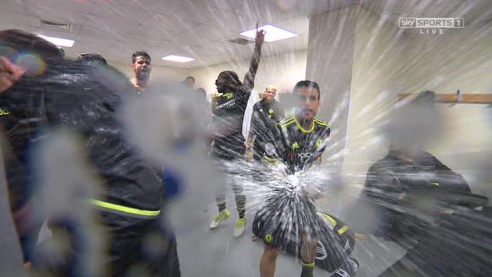  Chelsea players celebrate in the dressing room after winning the title