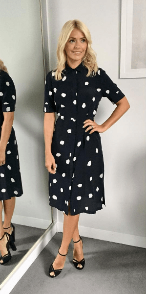  Holly Willoughby sent fans into a frenzy this week as she showed off her trim tum in a cute polka-dot dress