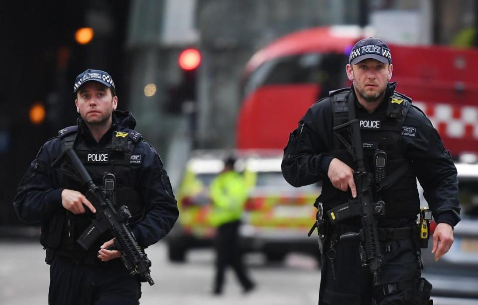  London Bridge remained on lockdown throughout Sunday, with heavily armed police patrolling the area near Borough Market