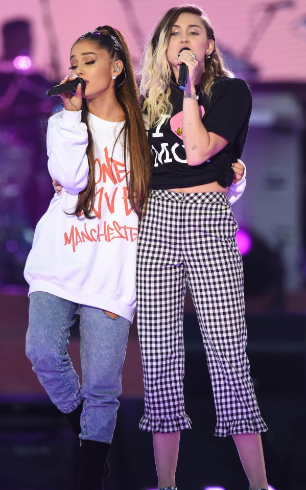  Ariana Grande and Miley Cyrus performing at the One Love tribute concert