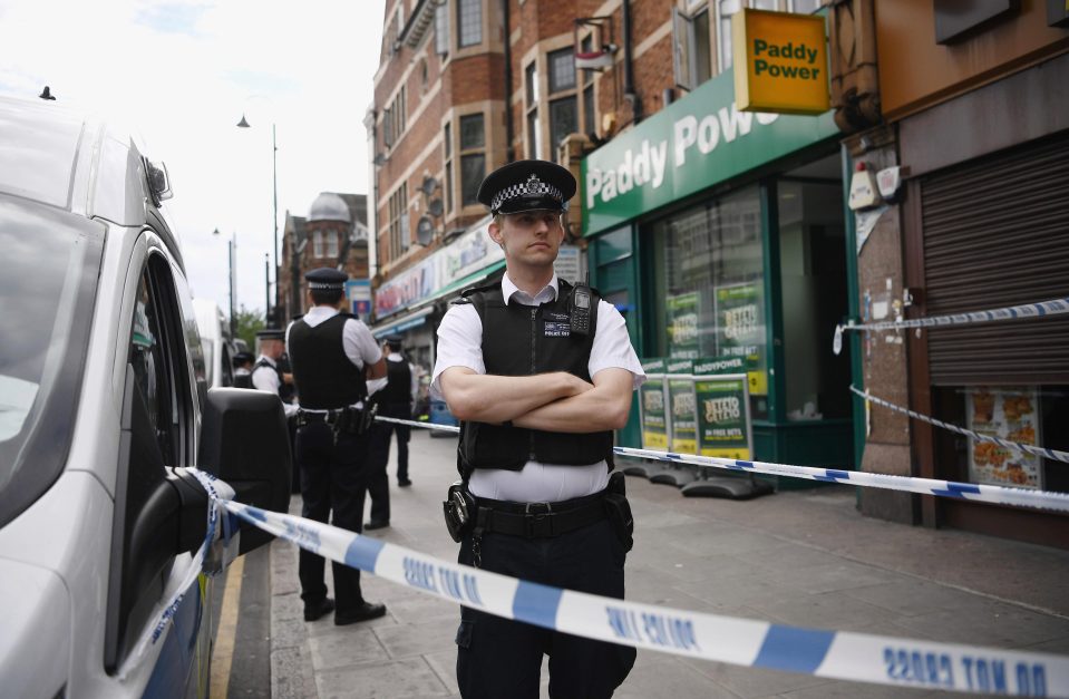  Neighbours said they did not recognise those who were arrested at the flat above the Barking bookies