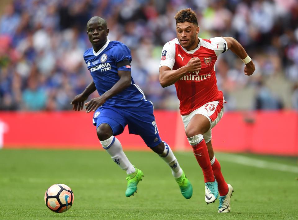  Alex Oxlade-Chamberlain takes on N'Golo Kante in the FA Cup final