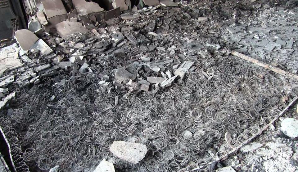  Twisted metal springs are all that remain of a bed in a Grenfell Tower flat gutted by Wednesday's inferno