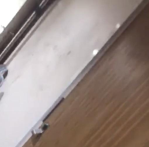  Chilling footage shows blackened handprints at the scene of the tower block