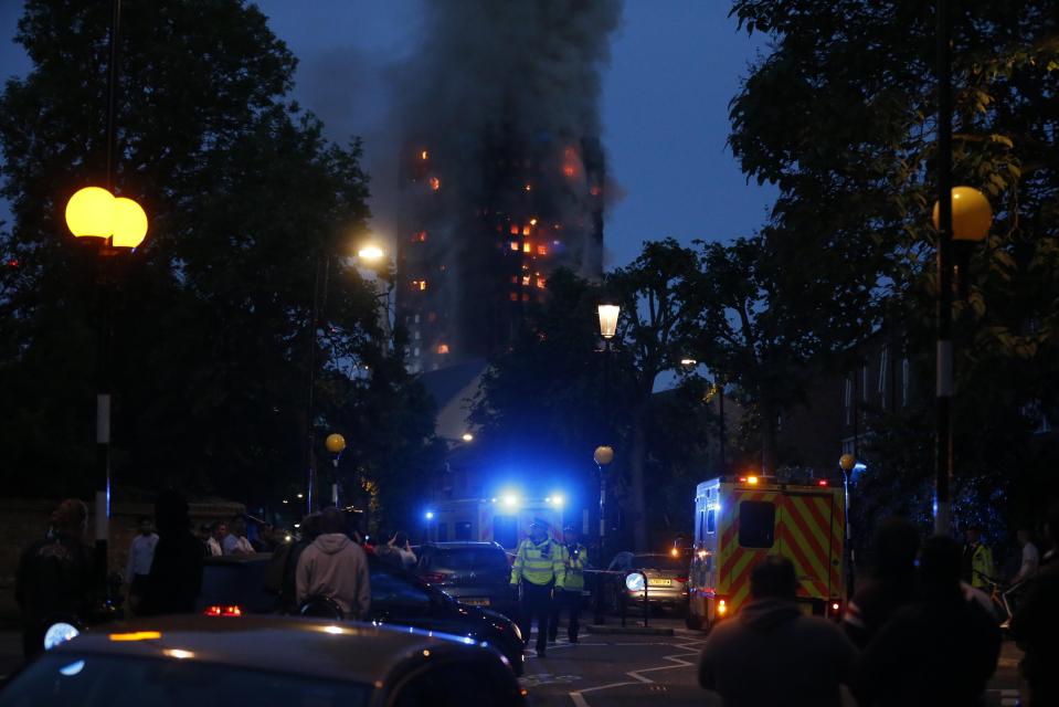  'Acrid' black smoke pours out of the building that has been gutted by fire