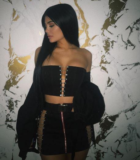  Kylie nearly bared all in a raunchy crop top and mini skirt that revealed she wasn't wearing any underwear