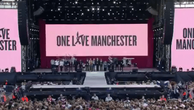  A crowd of thousands fell silent at the beginning of the concert to pay tribute to the terror victims - before erupting in defiant cheers