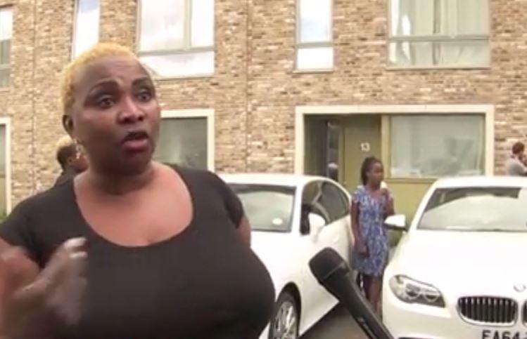 Ramou Grant, a neighbour who was invited to the party, speaking outside the Barking flat that was raided yesterday morning