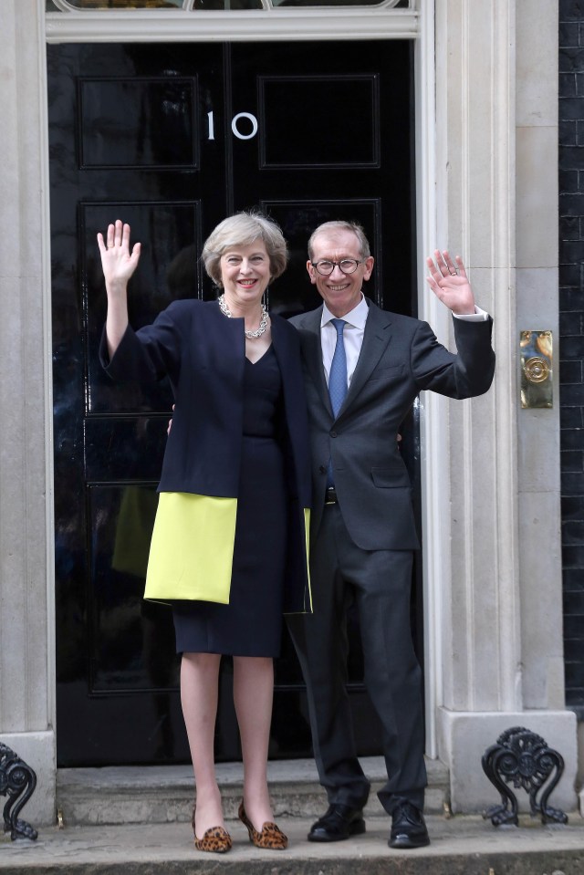 Theresa May with husband Philip entering No10 last year 