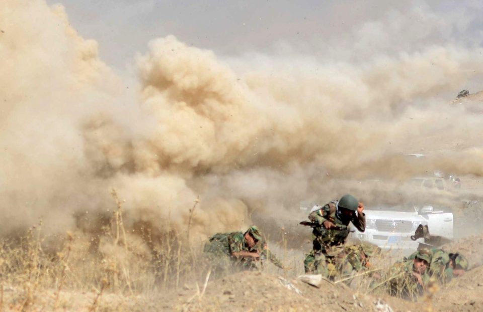  Smoke rises at Tercille village near Mosul following an ISIS suicide car bomb attack