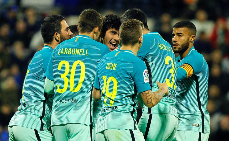  Carles Alena celebrates first goal for Barcelona's first team with team-mates