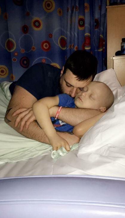  Bradley pictured in hospital with his dad Carl