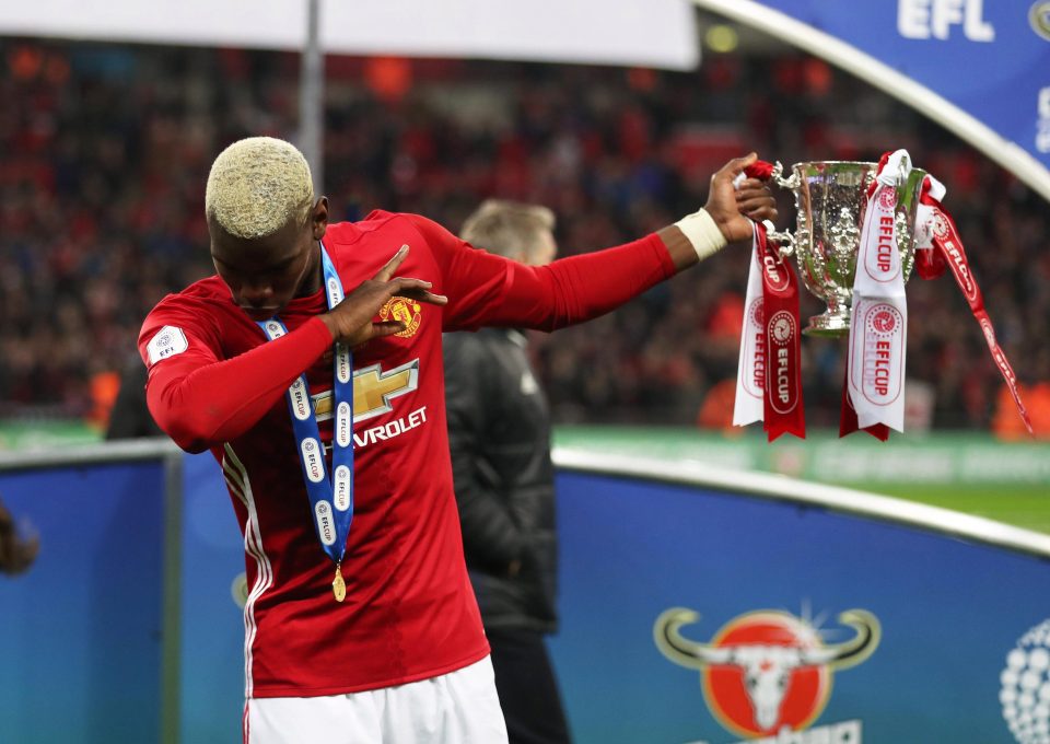  Paul Pogba celebrates winning EFL Cup with Manchester United