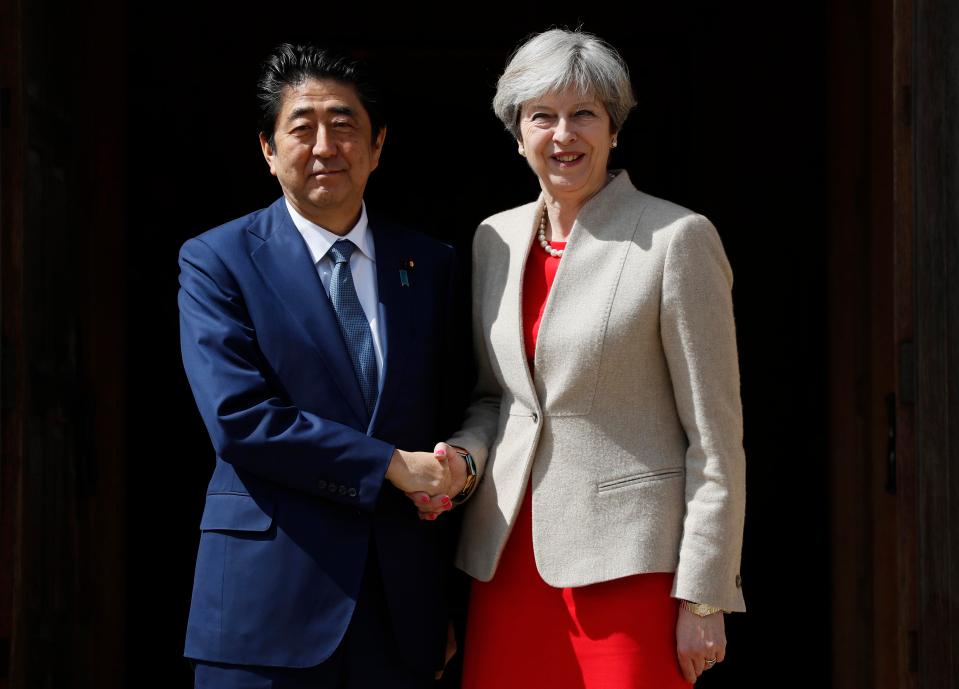  Shinzo Abe, pictured with Theresa May at last month's G7 summit, is keen to strike a trade deal with Britain