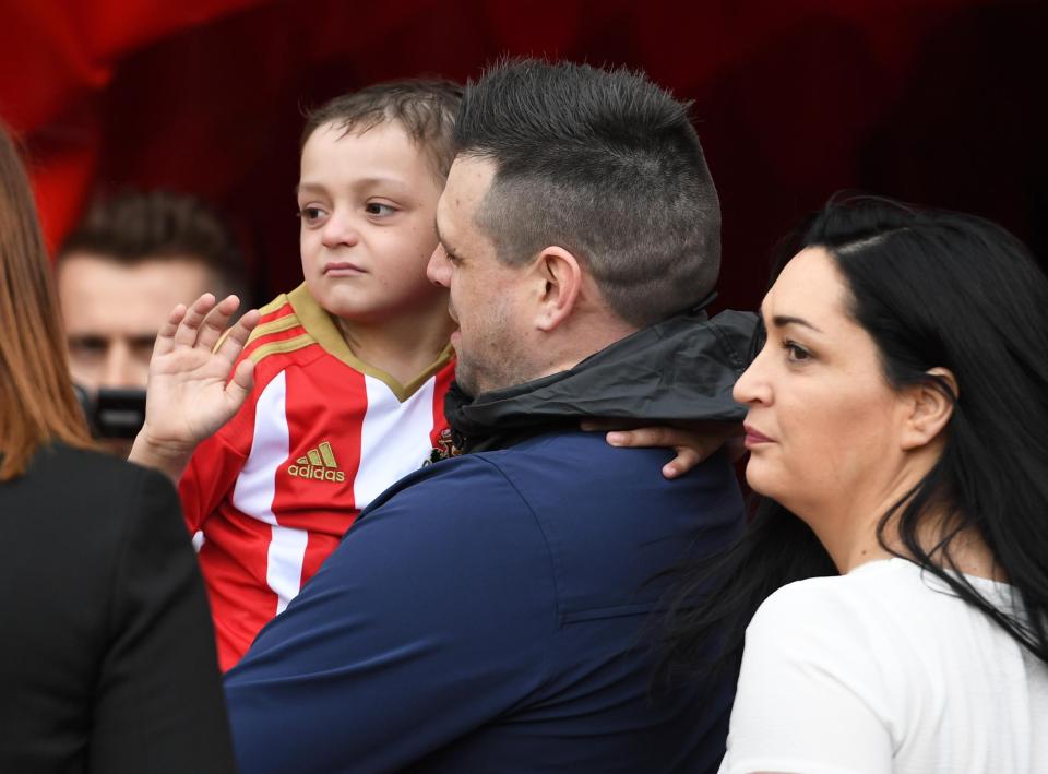  Bradley pictured with his parents, Carl and Gemma Lowery, at a Sunderland match in May