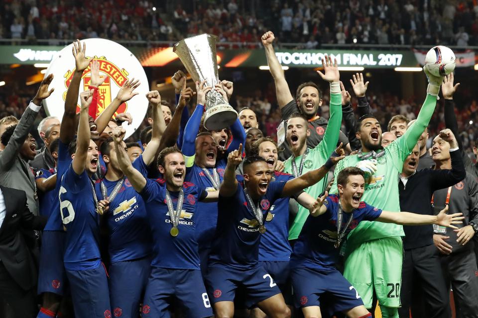  Manchester United celebrate winning the Europa League in Stockholm as they secured their place in next seasons Champions League