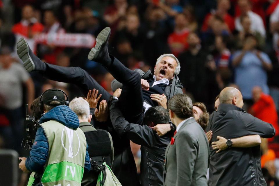  Jose Mourinho is thrown in the air after Manchester United beat Ajax 2-0 in the Europa League final