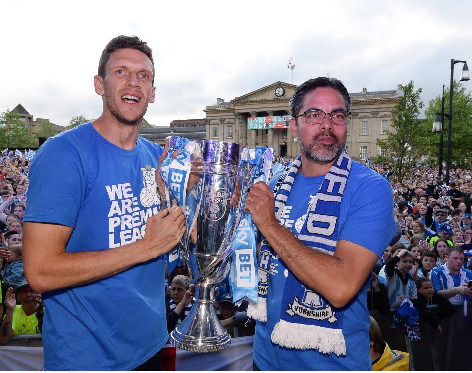  David Wagner with skipper Mark Hudson celebrating promotion to the Premier League