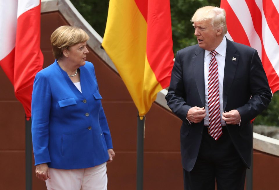  No love lost... Angela Merkel and Donald Trump were last week at loggerheads over the Paris agreement