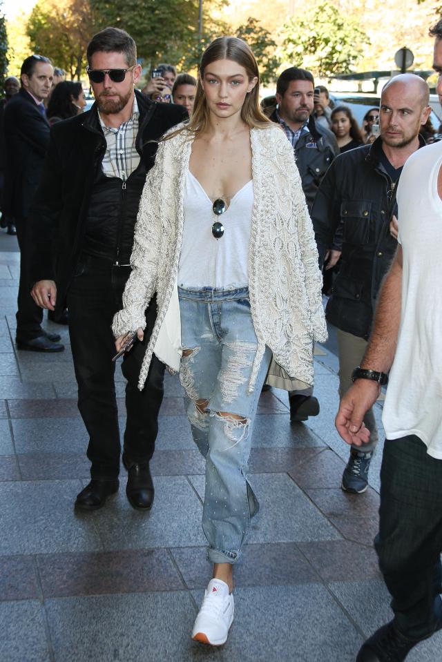  It's a look Gigi's rocked before back at Paris Fashion Week last year - with the Victoria's Secret model being one of many who have taken to the streets in 90s sports brands