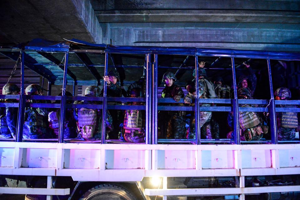  A truck with Filipino military personnel arrive outside the Resort World Manila hotel in Pasay city, south of Manila, Philippines