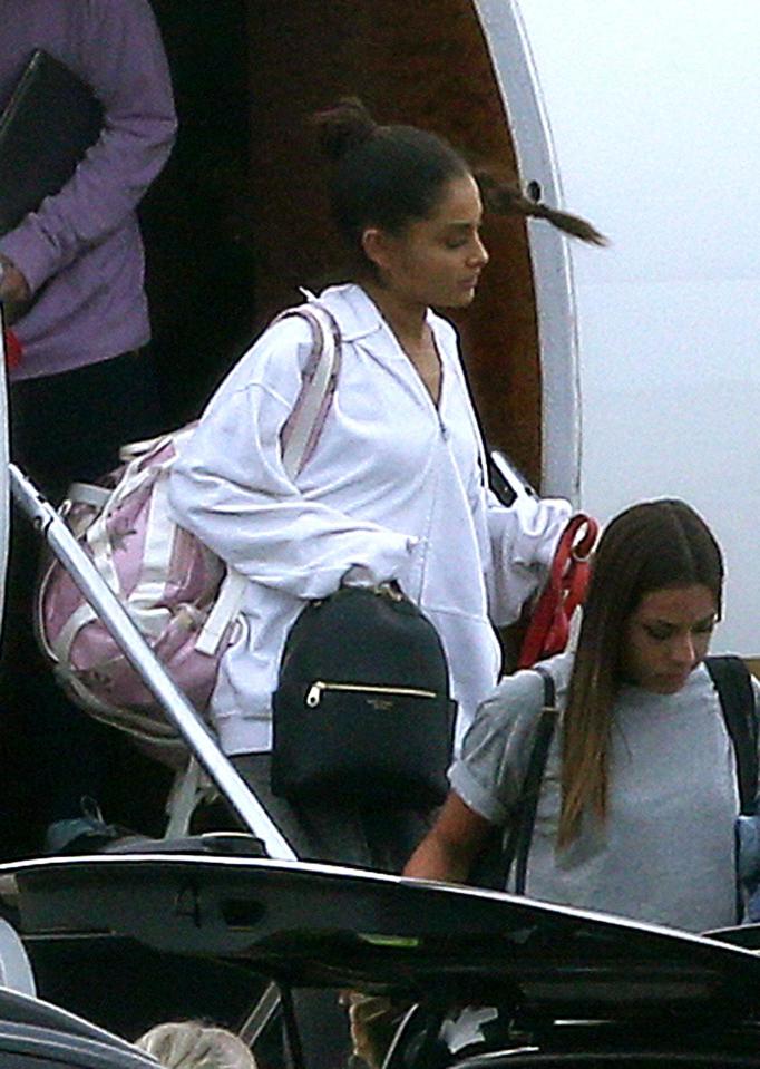  Ariana Grande has been pictured landing back in the UK