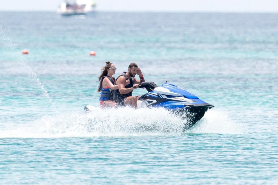  The couple took to the waters on a jetski during their holiday