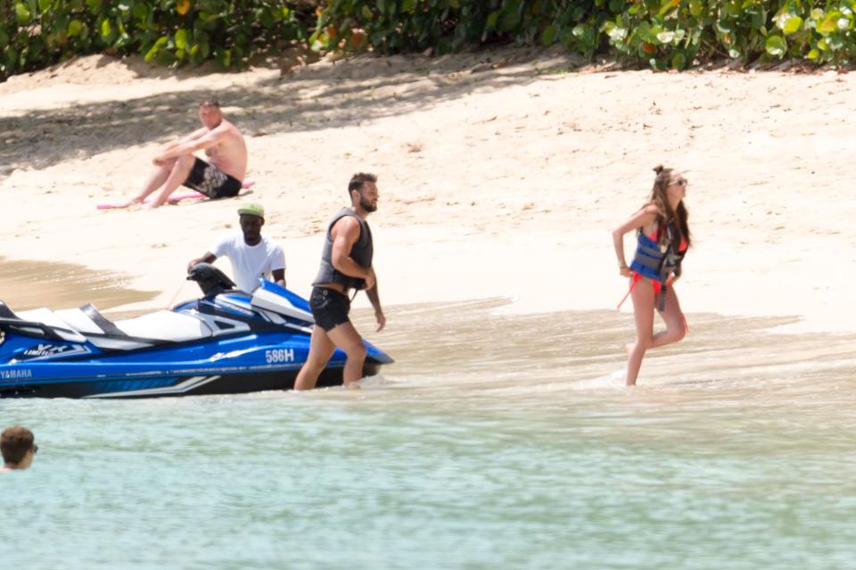  Charlie Austin on the beach with his wife Bianca