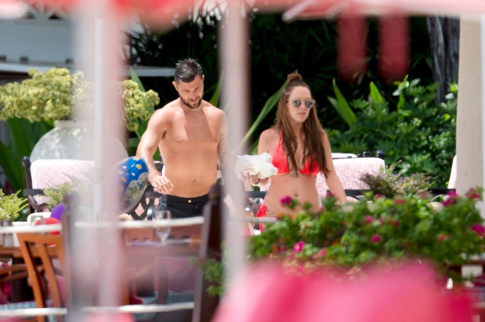  Charlie Austin and wife Bianca headed to a beach bar for a bite to eat