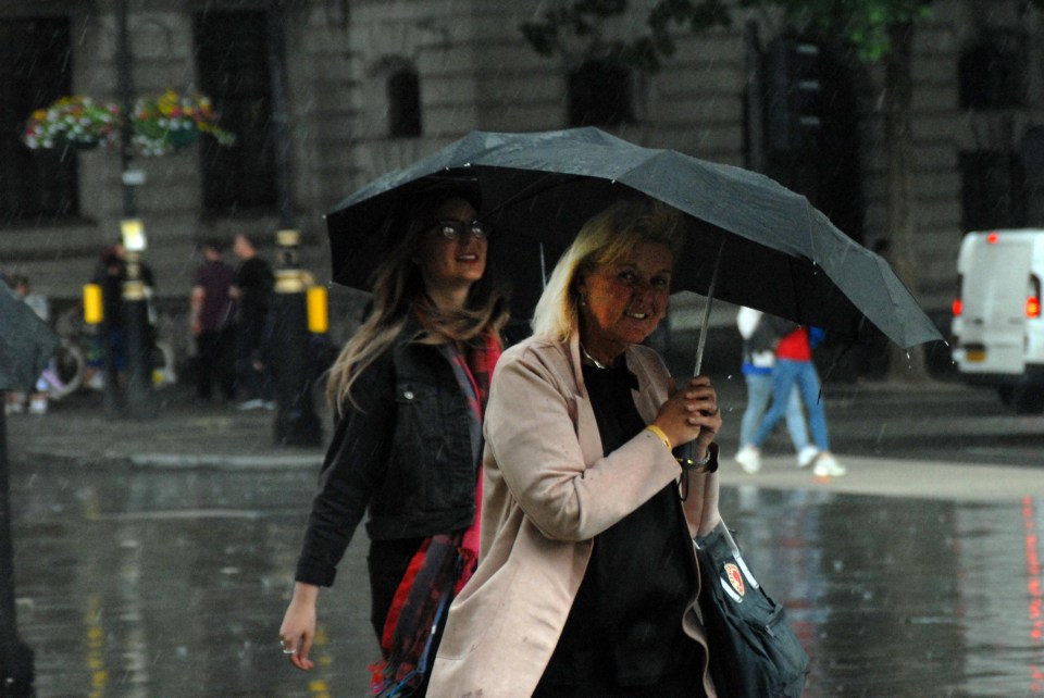 The heavy thunderstorm also caught out locals enjoying the warm weather in the West End