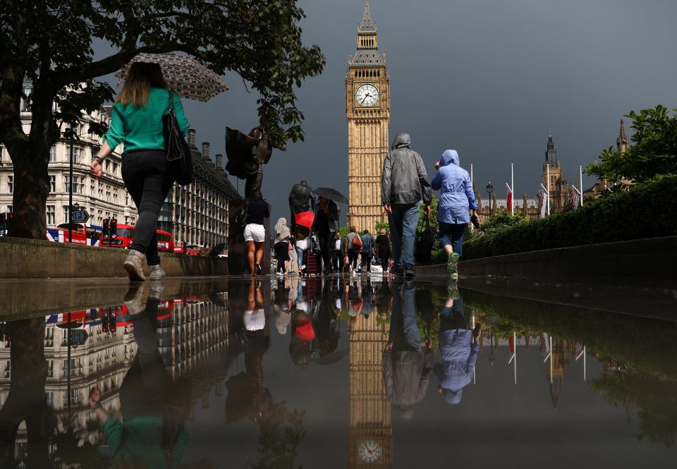  A grey capital ... Big Ben could be seen against a striking grey backdrop on Friday