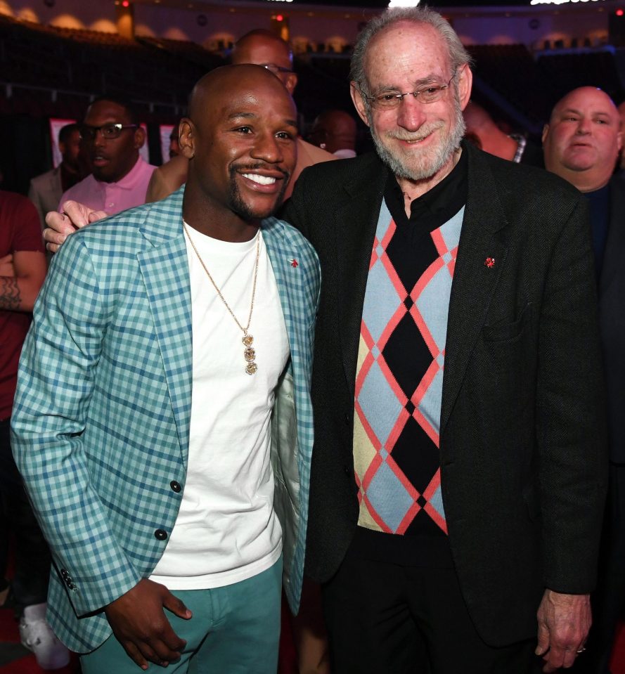  Floyd Mayweather poses with UFC Vice President of Regulatory Affairs Marc Ratner