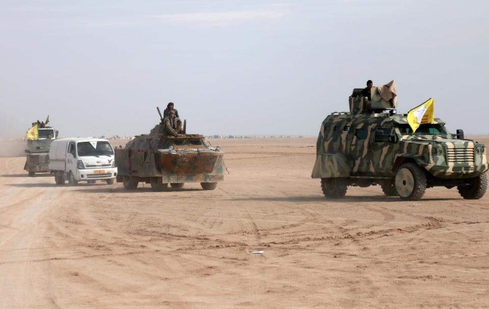  SDF troops pictured advancing on Raqqa this week