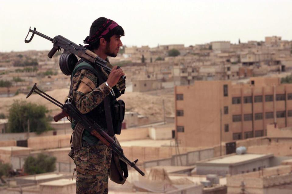  An SDF solider in Tabqa, Syria, near Raqqa, which is being stormed by a US-led coalition today