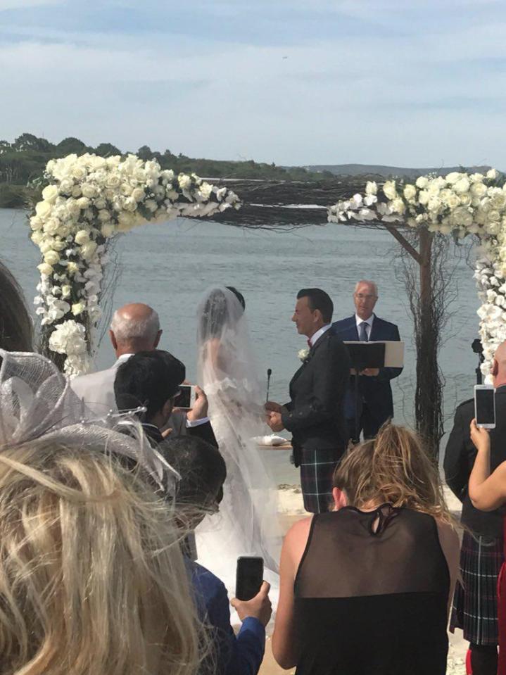 The couple married in Portugal overlooking the sea