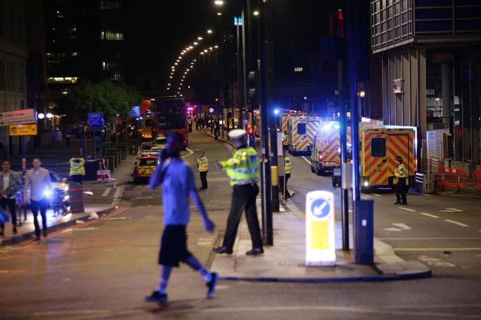  Emergency services at the scene last night after terrorists ploughed a van into London Bridge