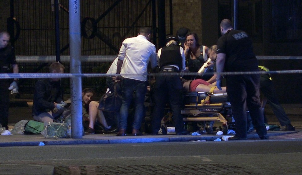 A victim being treated on a stretcher following the terror attack on London Bridge