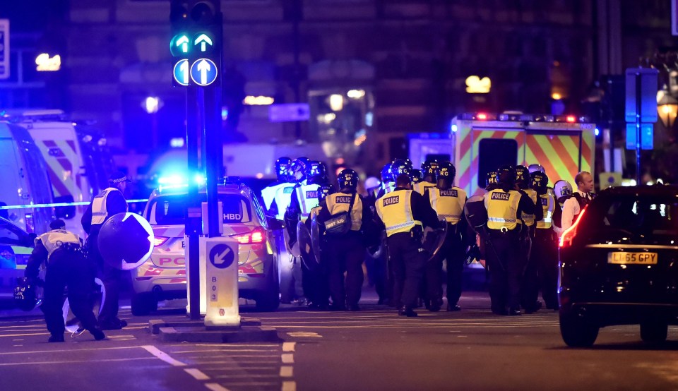 Armed cops at the scene on London Bridge on Saturday night after three terrorists went on a rampage