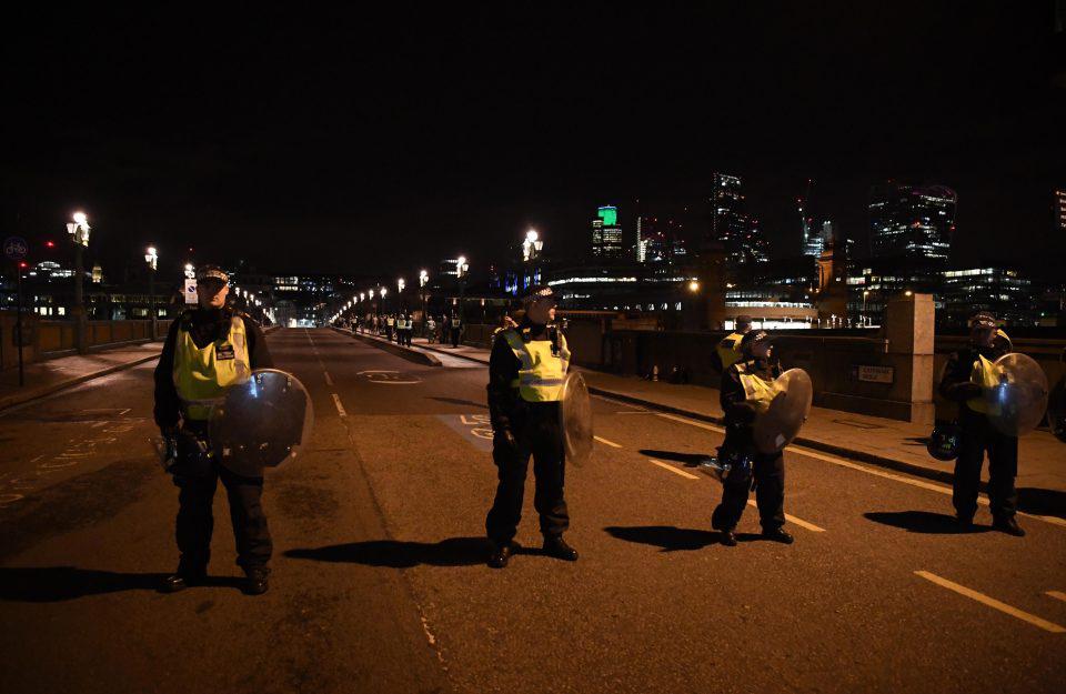 Cops guard London Bridge after the terrorist ploughed through crowds at the beginning of their rampage