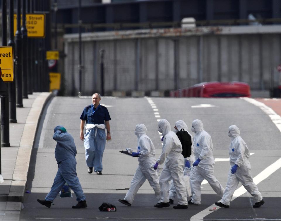  Forensics were pictured at the scene on Sunday morning